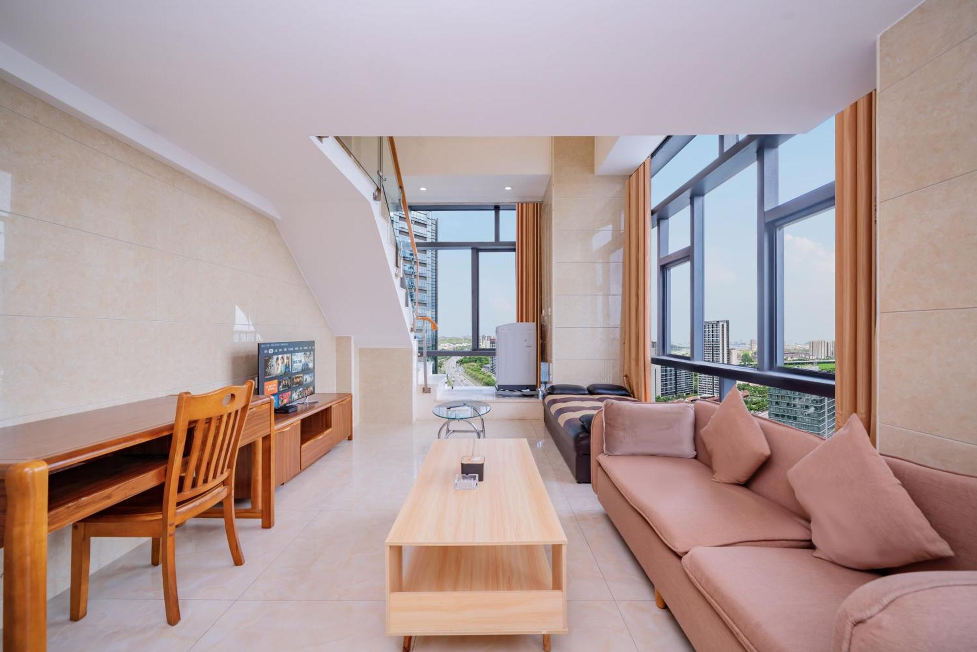 April Fair Duplex Apartment Guangzhou South Railway Station Ao Yuan Yue Shi Dai Branch Exterior foto